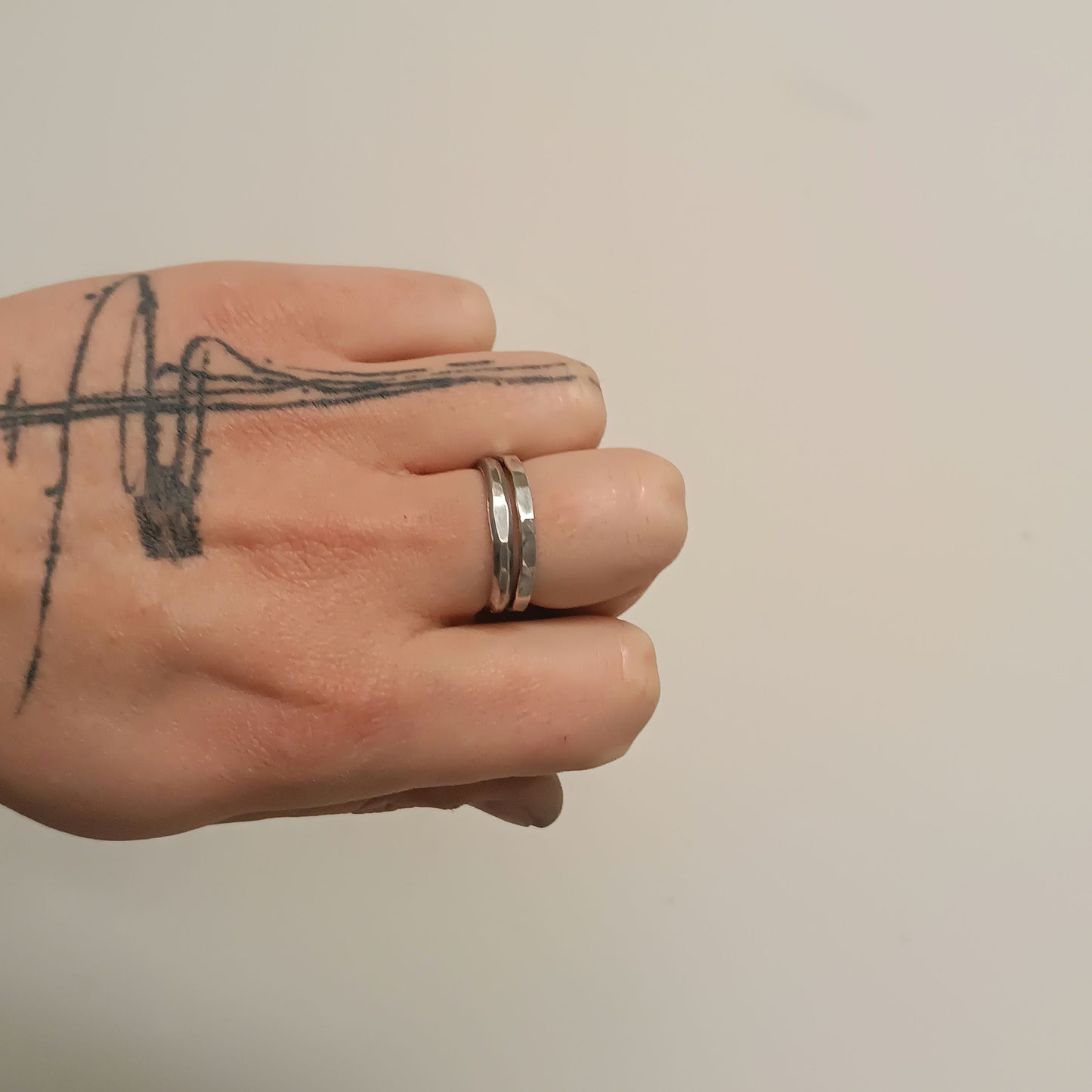 COUPLE OF HAMMERED RINGS