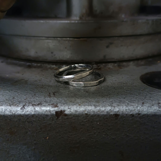 COUPLE OF HAMMERED RINGS